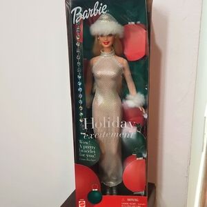 Vintage 2001 Holiday Excitement Blonde Barbie is a doll white dress bracelet